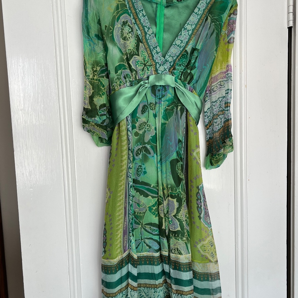 Not available: Silk dress slight need for sewing on one arm